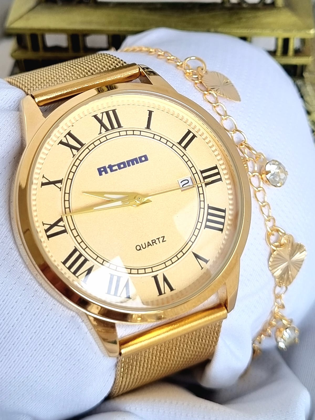 Relógio Feminino Pulseira Esteira Banhado a Ouro Atomo k2