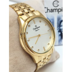 Relógio Dourado Champion CN25841H